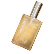 Gracious Velvet Rose Restoring Body Oil pale yellow liquid clear bottle